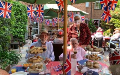 Why is living at Woodlands and Hill Brow Care Home good for mental wellbeing of the elderly?